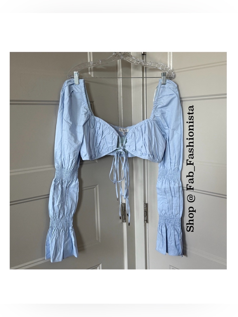 Front tie crop top with statement sleeves